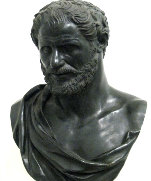 Bust tentatively identified as Democritus, cast of Roman artifact from Villa dei Papiri. CC BY-SA 3.0 via Wikimedia Commons.